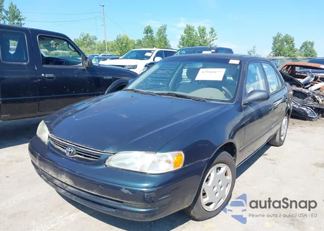 1999 Toyota Corolla Ce из США, поврежденный, VIN 2T1BR12E1XC119351